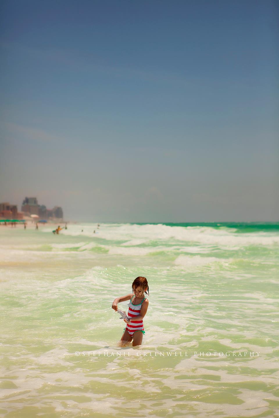 toy shark playing in water sand gulf beach emerald coast destin florida stephanie greenwell photography