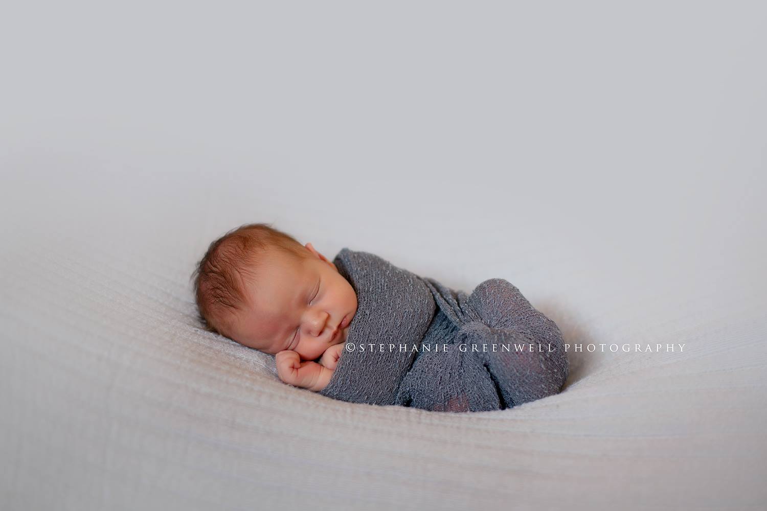 newborn boy wrap eli blue meghan moore southeast missouri photographer stephanie greenwell