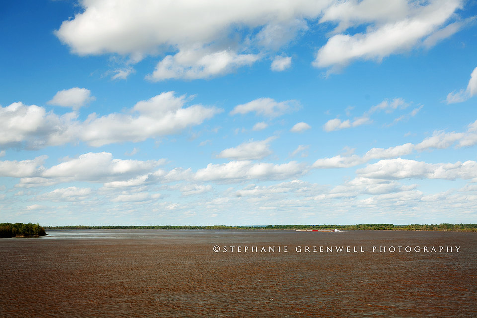 mississippi river spring day clouds blue sky southeast missouri photographer stephanie greenwell