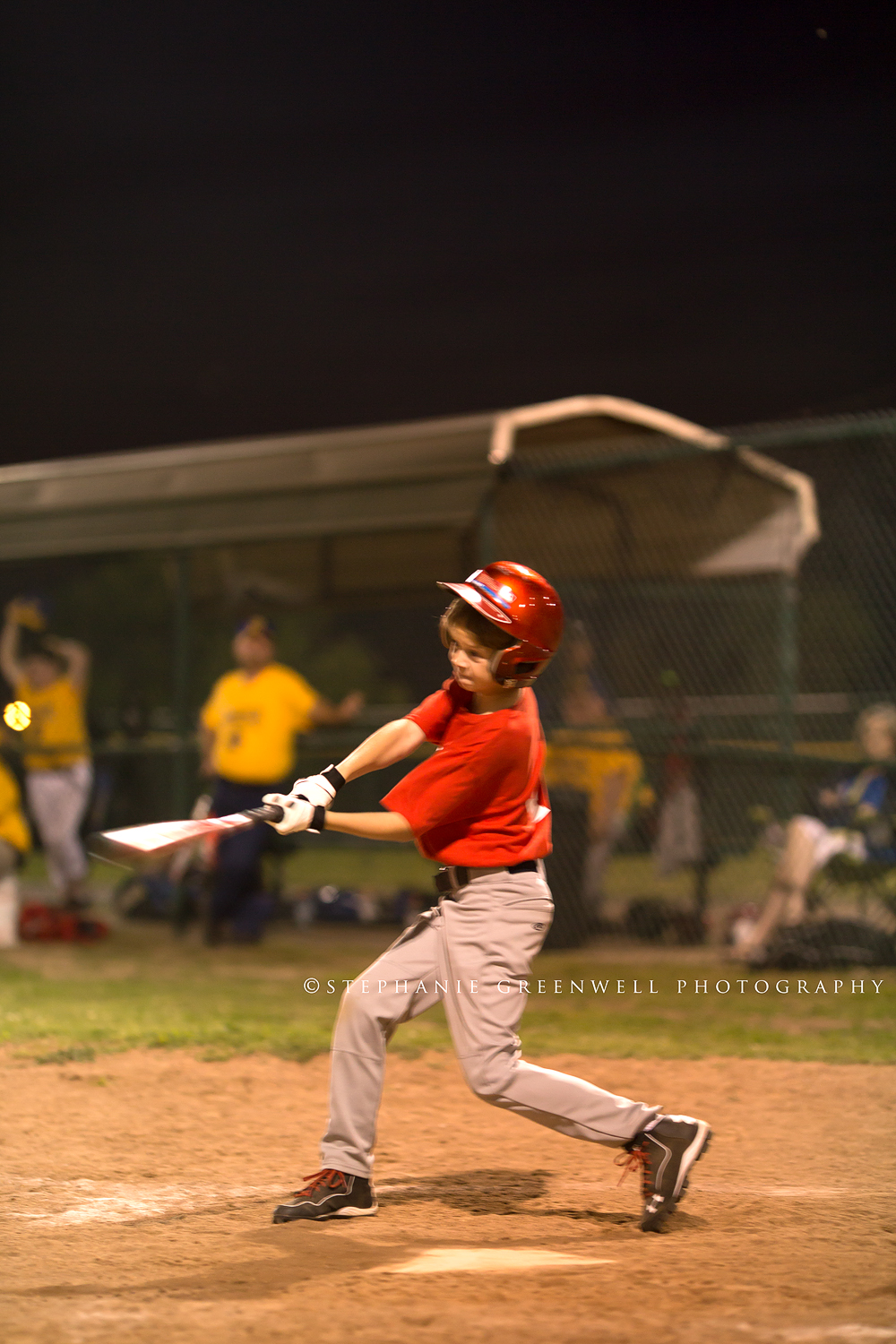 caruthersville baseball coach little league boy hits ball southeast missouri photographer stephanie greenwell