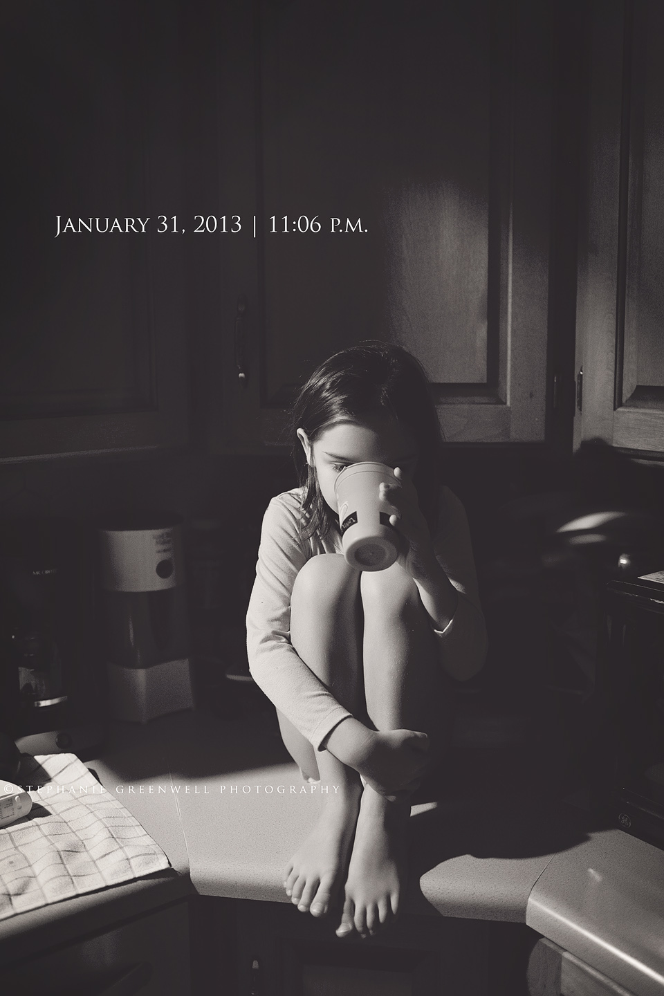 girl drinking milk in kitchen project life stephanie greenwell photography missouri