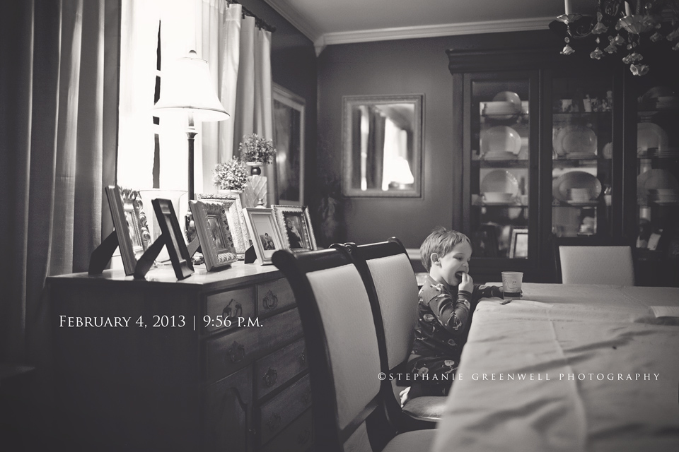 boy eating cookies and milk at table pajamas stephanie greenwell photography