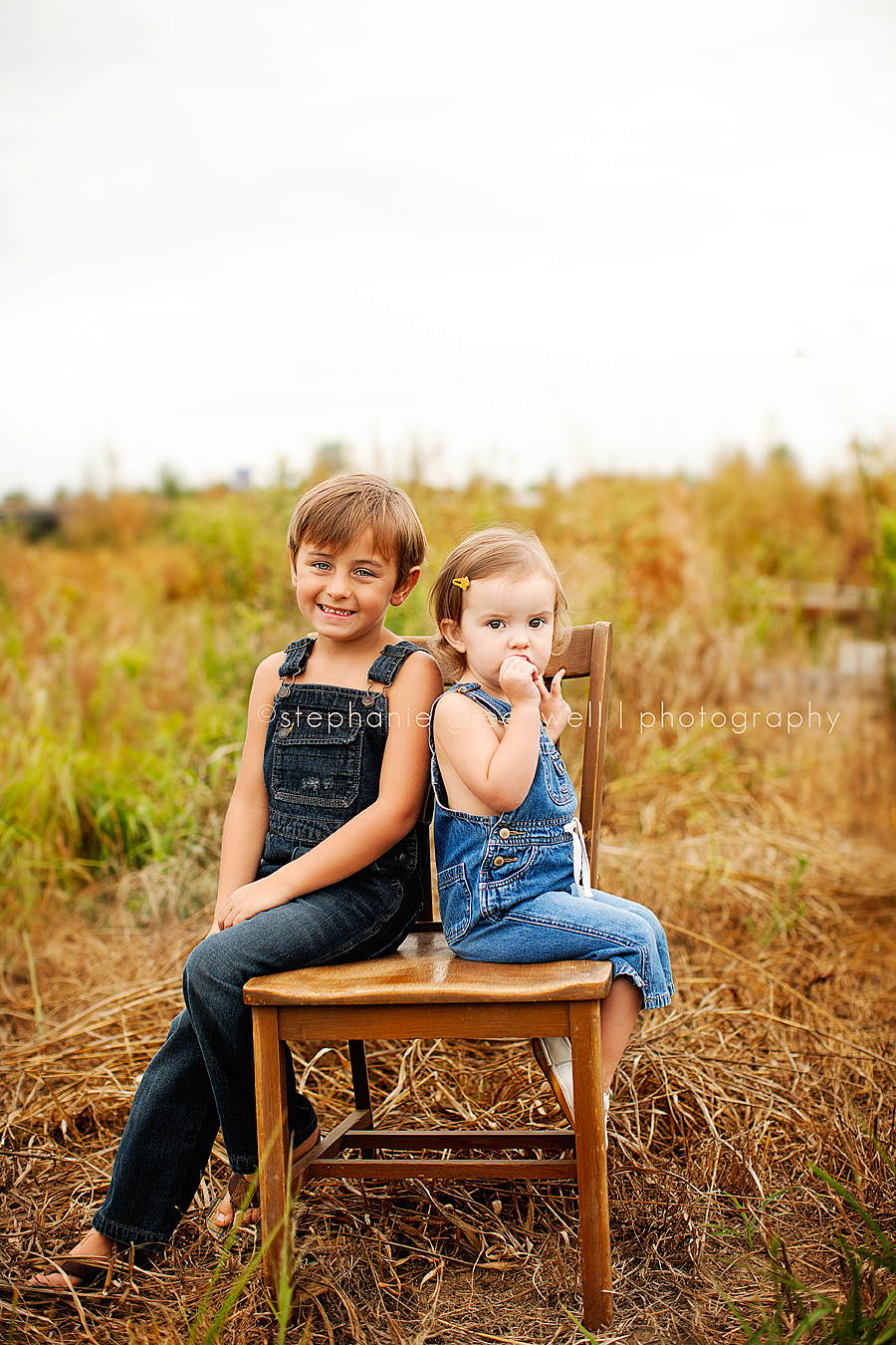 children siblings overalls field wooden chair southeast missouri child photographer