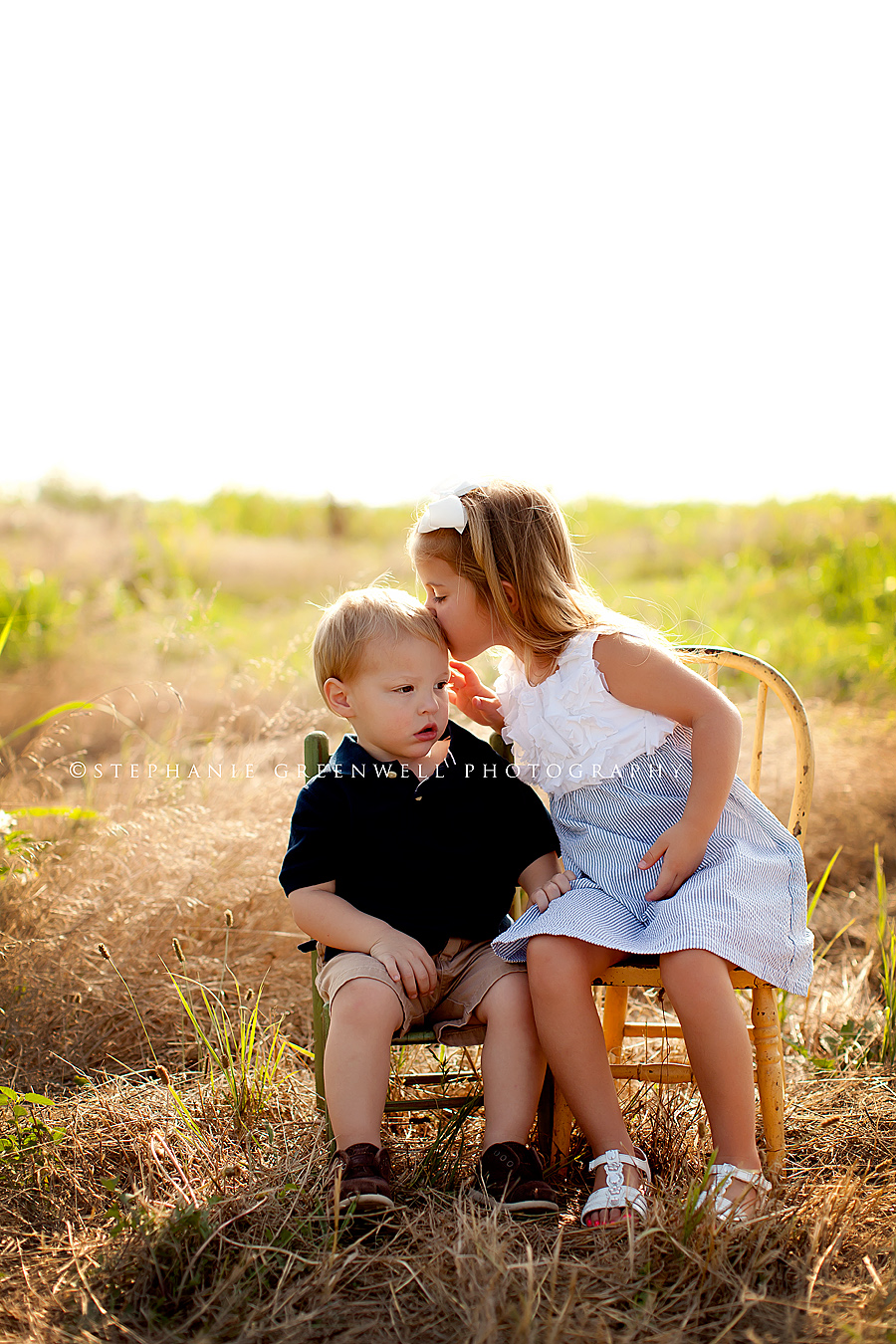 kissing cousins in a field little boy little girl missouri stephanie greenwell