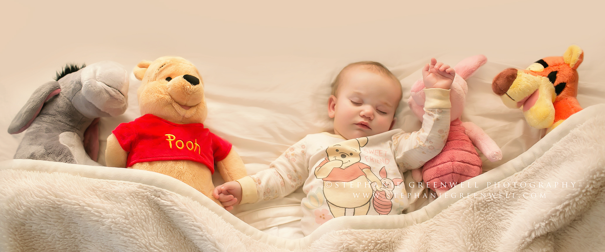 sleeping baby stuffed animals winnie the pooh piglet eeyore tigger bed pajamas stephanie greenwell photography southeast missouri